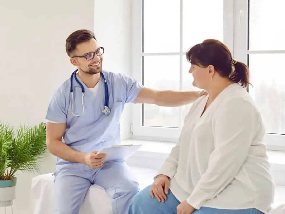 Physician reassuring a patient during a visit at Bariatric Care Center